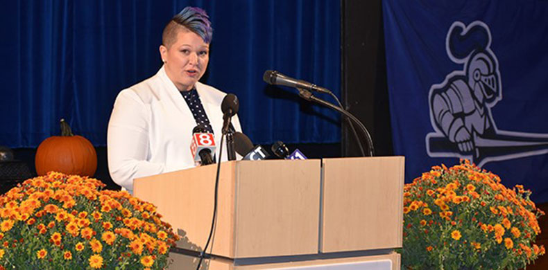    Carolyn Kuhr '98 Kielma accepts her award for Connecticut's Teacher of the Year. On her hair, Kielma said, It actually helps...