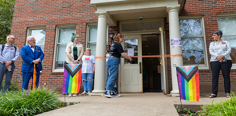 Students cut the ribbon on the new LGBTQ+ Resource Center.