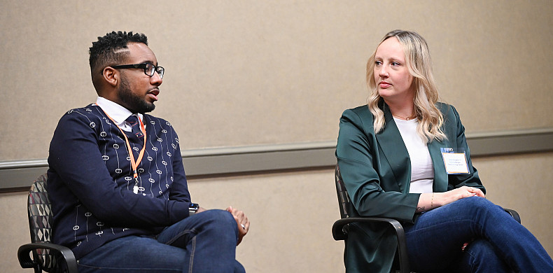 Two alumni discuss networking as part of a Break Through panel.